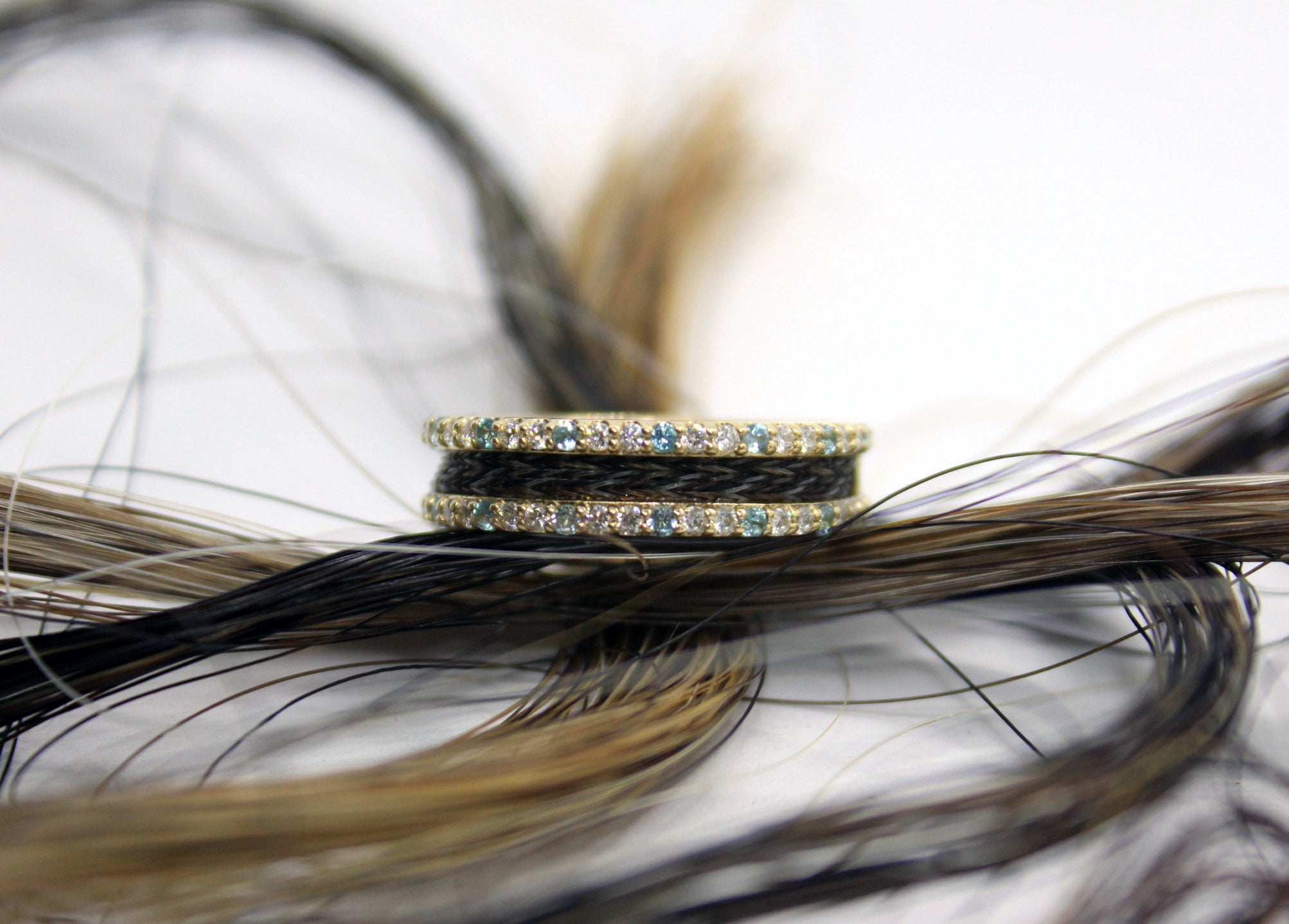 custom horsehair ring in gold with diamonds