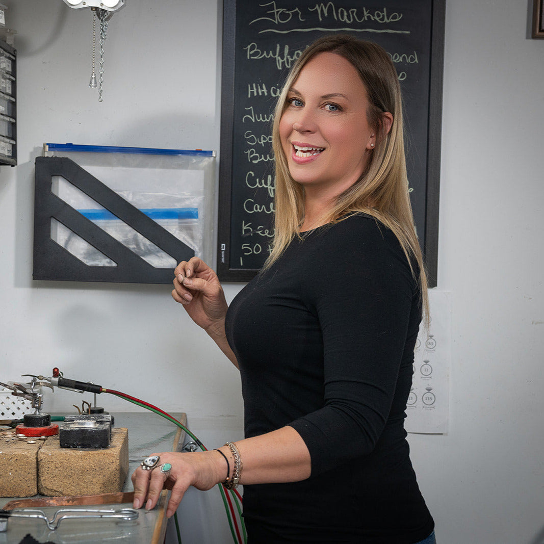 verstara woman working with solder silversmith