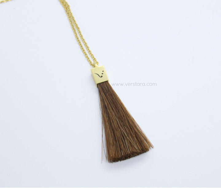 gold horse hair tassel necklace