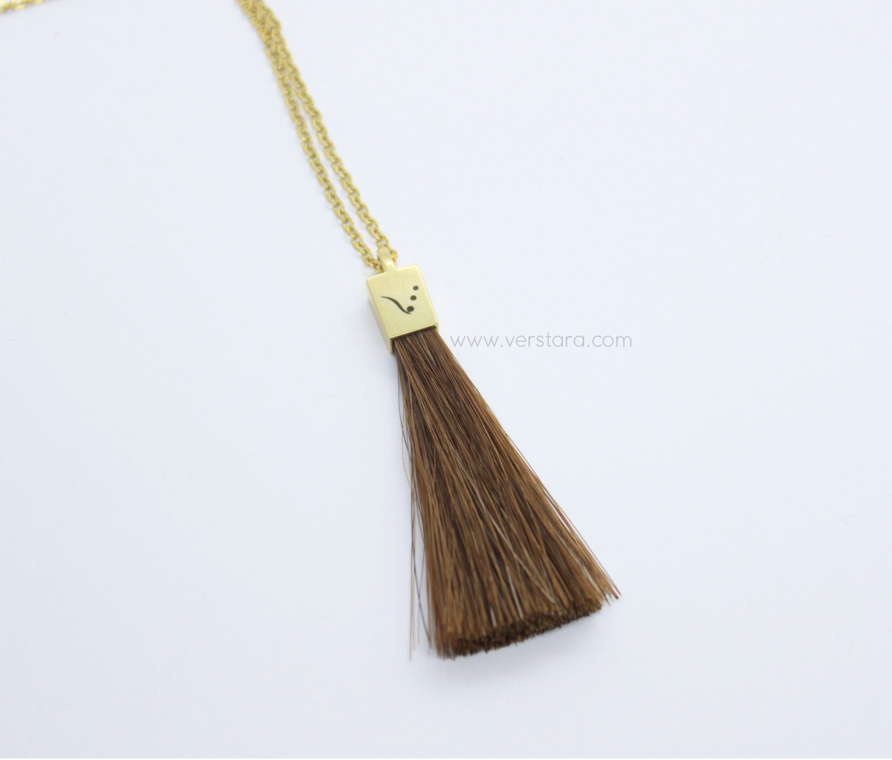 14k gold blacksmith inspired necklace with horsehair tassel