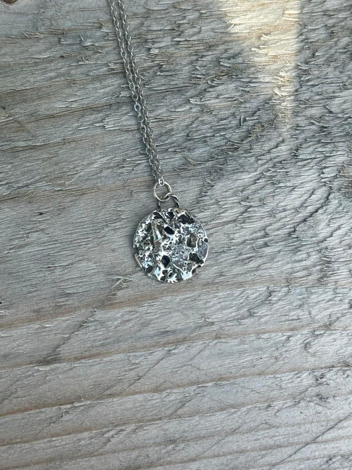 Cast in Ash cremation pendant, unique pattern created by casting metal over loved ones ashes