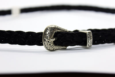 Hat band buckle hatband is made of braided horsehair on a white background