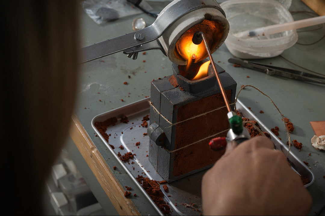 Colleen at Verstara had pouring metal into a mold to create a custom design piece of horsehair jewelry